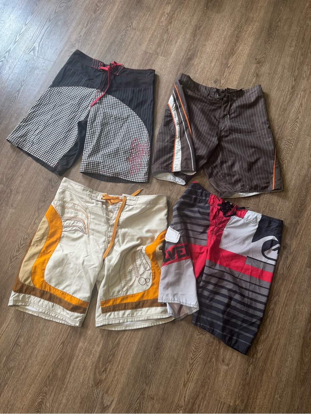Men's Black and Orange Mixed-Pattern Swim Trunks